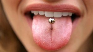 woman with tongue piercing