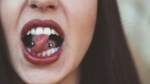 woman with tongue piercing