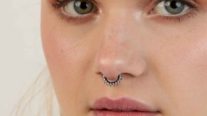 woman with septum ring essential beauty