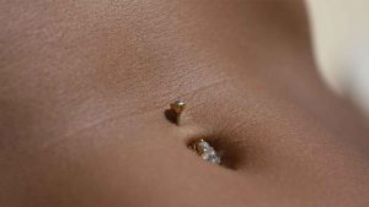 Belly button piercing: infections, rejections, pain and how long it takes  to heal